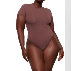 Skims Stretch Cotton Jersey T-shirt Bodysuit In Garnet